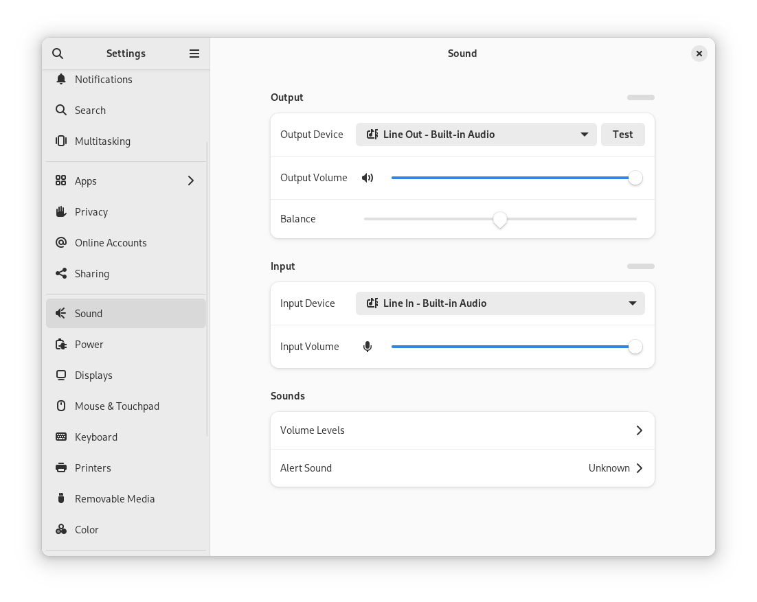Sound settings dialog showing output and input device selection, balance and volume controls and alert sound settings Sound settings dialog showing output and input device selection, balance and volume controls and alert sound settings